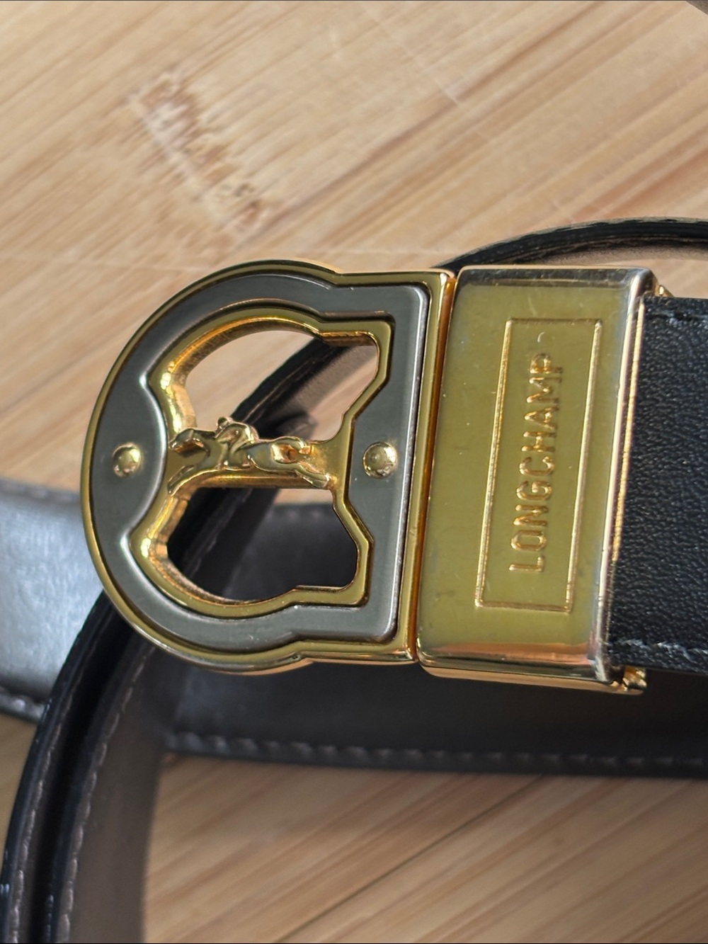 Black belt with gold tone buckle.